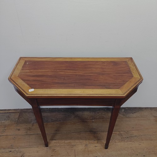 1329 - A George III mahogany and satinwood crossbanded folding card table, 96 cm wide