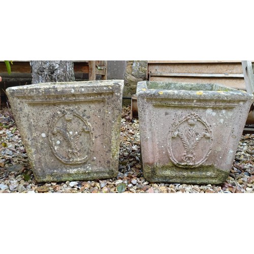 1434 - A pair of composite stone planters, decorated thistles