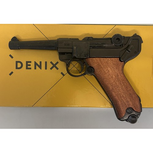 411 - A Denix replica Luger P08 pistol and another similar, a GP35 pistol, both boxed (2) Provenance: On I... 