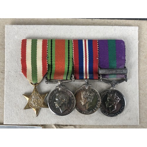 230 - A group of four medals, awarded to Captain The Hon D H Erskine SG, comprising an Italy Star, Defence... 