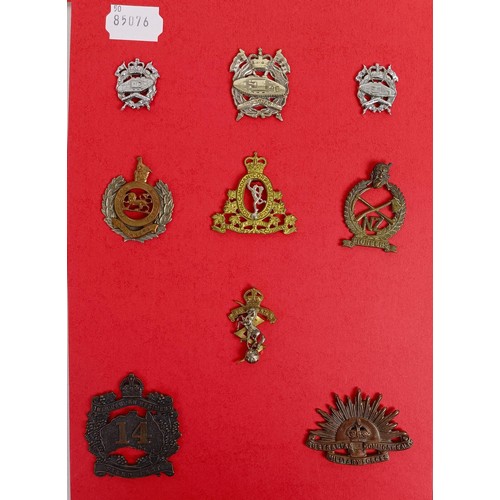 431 - A group of assorted military badges, including HAC, XII Royal Lancers, Derbyshire Yeomanry and other... 