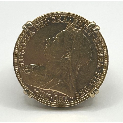 301 - A Victorian sovereign, 1894, in a 9ct gold ring...