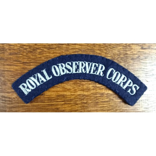 264 - An Observer Corp medal, awarded to Observer G E Cope, boxed, with a cloth shoulder title and copy do... 