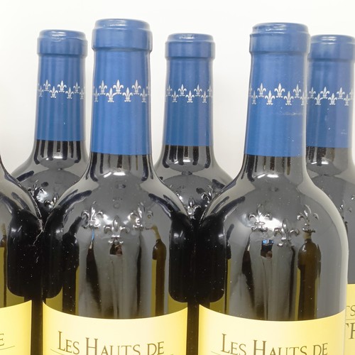 2049 - Eleven bottles of red Les Haut de Smith, Pessac-Leognan, 2009, and a bottle of white Les Haut de Smi...