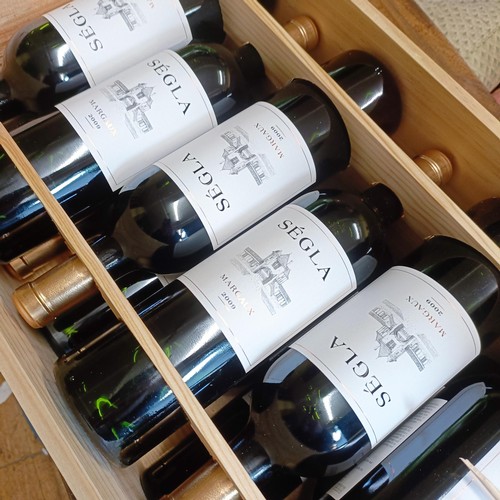 2077 - Twelve bottles of Segla, Margaux, 2009 (12)Provenance: From a West Country House, stored in a temper... 