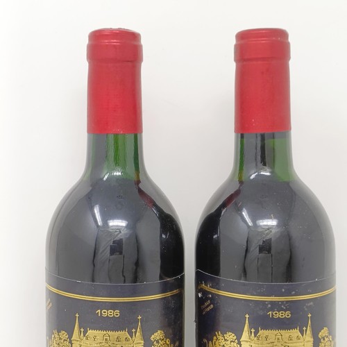 2124 - Two bottles of Chateau Palmer, Margaux, 1986 (2)Provenance: From a West Country House, stored in a t... 