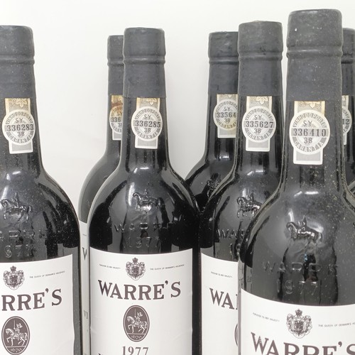 2144 - Twelve bottles of vintage port, 1977, Warre's (12)Provenance: From a West Country House, stored in a... 