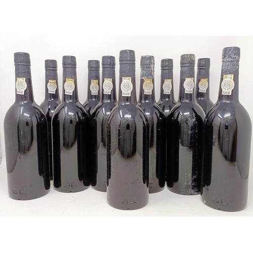 2144 - Twelve bottles of vintage port, 1977, Warre's (12)Provenance: From a West Country House, stored in a... 