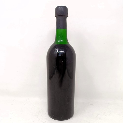 2166 - A bottle of 1963 vintage port, TaylorsProvenance: From a West Country House, stored in a temperature... 