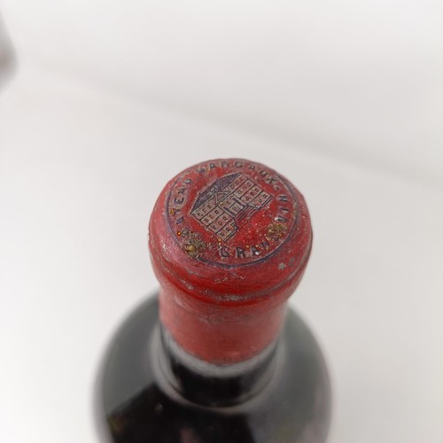 2185 - A magnum of Chateau Margaux, Margaux, vintage unknown, believed to be 1950s<br /><br />Provenance: F...