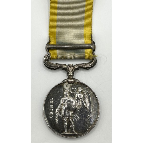 522 - A Crimea medal, with a Sebastopol clasp, defective, un-named Provenance: On Instructions of the Fami... 