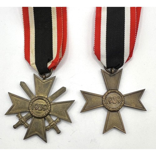 539 - A German World War II War Merit Cross, with Swords, and another similar (2) Provenance: On Instructi... 