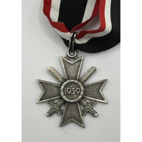 540 - A Germany World War II War Merit Cross, with Swords Provenance: On Instructions of the Family: Medal... 