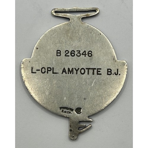 477 - A Royal Canadian Engineers Gibraltar medal, or watch fob, the back stamped B26346 L-Cpl M Amyotte BJ... 