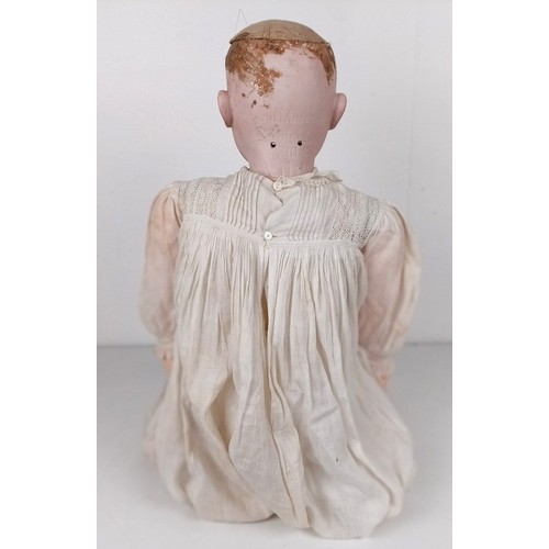 900 - An Armand Marseille bisque head doll, with a jointed body, and glass millefiori eyes, No 390, 74 cm ... 