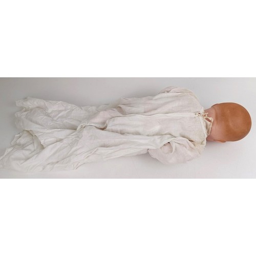 912 - An Armand Marseille bisque head baby doll, with a composite and cloth body, 42 cm, and another (2) P... 