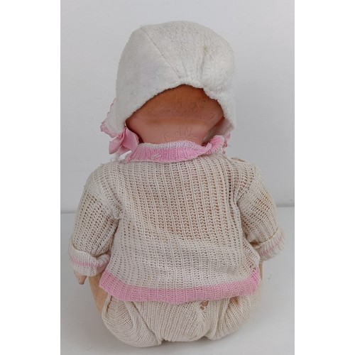 912 - An Armand Marseille bisque head baby doll, with a composite and cloth body, 42 cm, and another (2) P... 