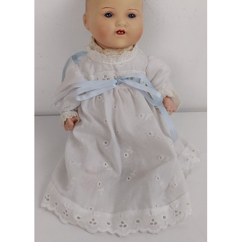 913 - An Armand Marseille bisque head baby doll, with a composite body, 31 cm, and another, 26 cm (2) Prov... 