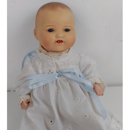 913 - An Armand Marseille bisque head baby doll, with a composite body, 31 cm, and another, 26 cm (2) Prov... 