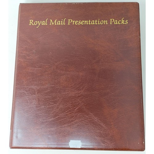 706 - Assorted Royal Mail presentation packs, and assorted world stamps, in numerous albums (box)