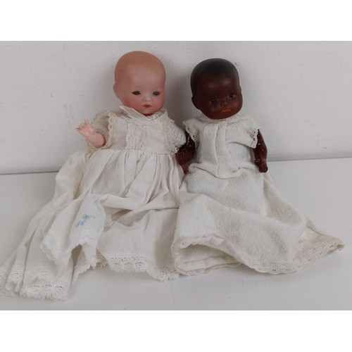 915 - A German Armand Marseille baby doll, 30 cm and two other baby dolls (3) Provenance:  From a lar... 