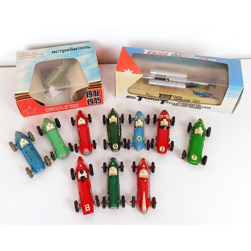 945 - A Lledo model, Thrust SSC, boxed and assorted boxed cars, buses and other models (box)