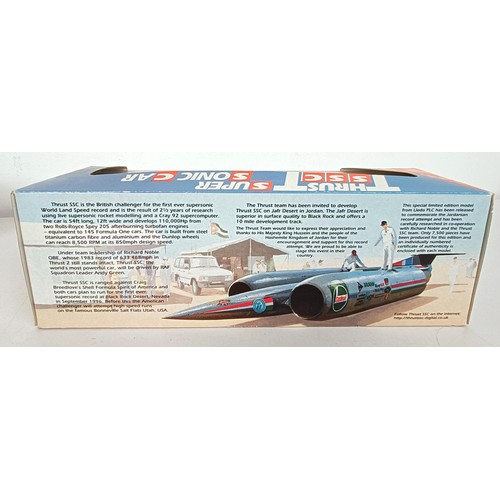 945 - A Lledo model, Thrust SSC, boxed and assorted boxed cars, buses and other models (box)