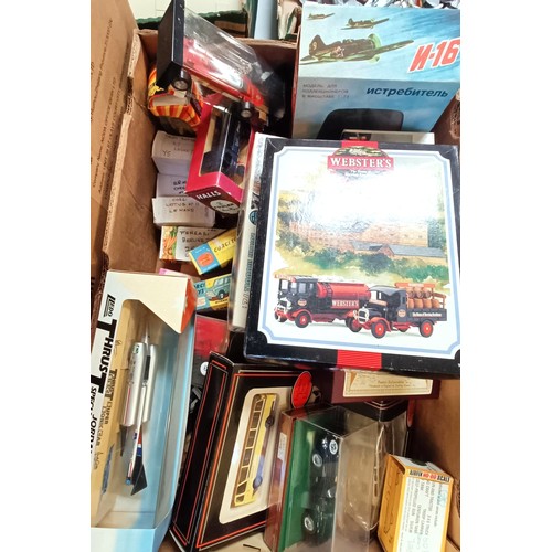 945 - A Lledo model, Thrust SSC, boxed and assorted boxed cars, buses and other models (box)