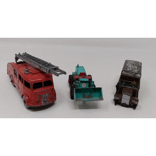 973 - A Dinky Toys fire engine, and assorted other play worn cars and trucks