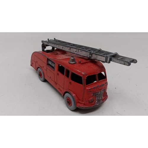 973 - A Dinky Toys fire engine, and assorted other play worn cars and trucks