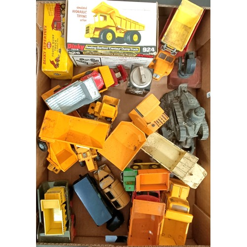 990 - Assorted play worn toy dumper trucks and other trucks, and a Dinky Supertoys box only, No 959