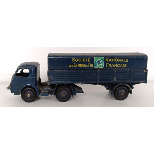 990 - Assorted play worn toy dumper trucks and other trucks, and a Dinky Supertoys box only, No 959