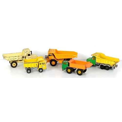 990 - Assorted play worn toy dumper trucks and other trucks, and a Dinky Supertoys box only, No 959