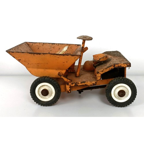 992 - A tinplate model tractor and other play worn toys (box)