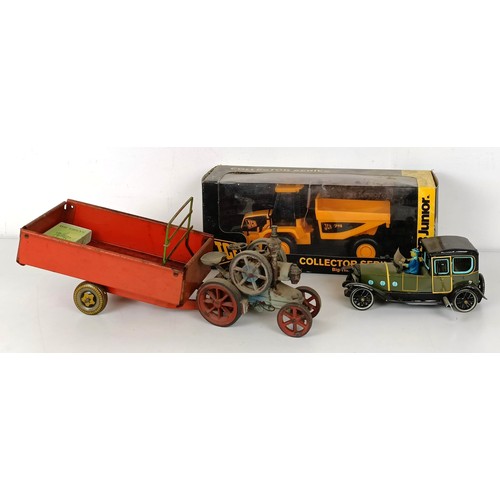 992 - A tinplate model tractor and other play worn toys (box)