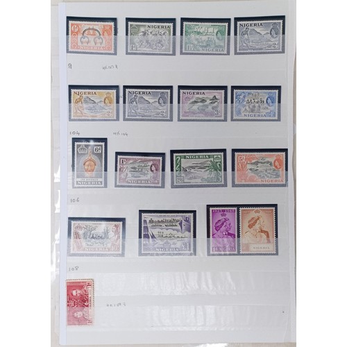 678 - A group of Nigeria stamps, including Niger and Southern Nigeria, with mint sets