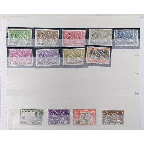 682 - A group of Nyasaland mint and used stamps, with sets