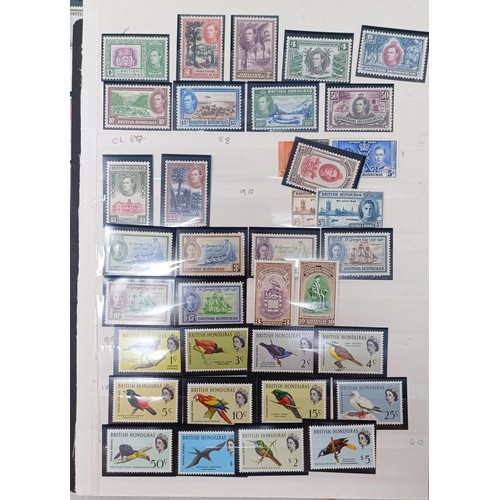 653 - A group of British Honduras mint sets and used stamps