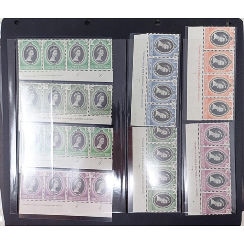 634 - A group of Elizabeth II Coronation mint stamps, including blocks