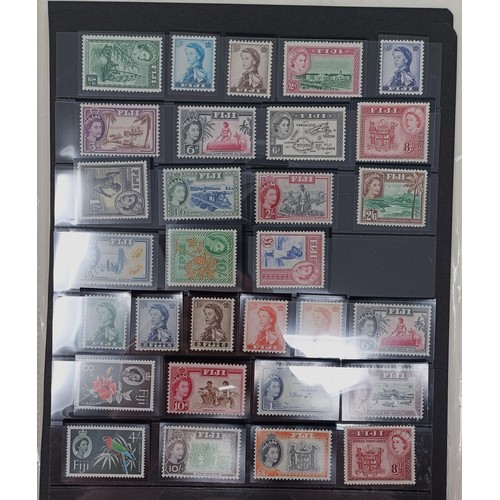 646 - A group of Fiji and Brunei stamps, mint and used, including sets