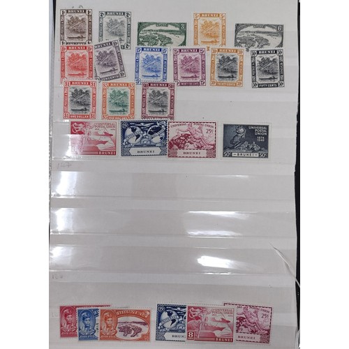 646 - A group of Fiji and Brunei stamps, mint and used, including sets