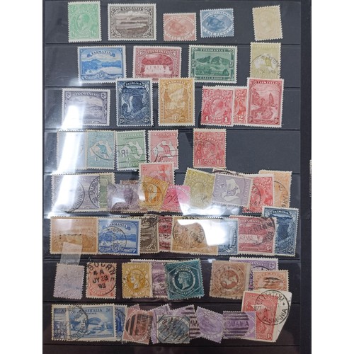 647 - A group of Australia stamps, including Tasmania, mint sets, some unmounted