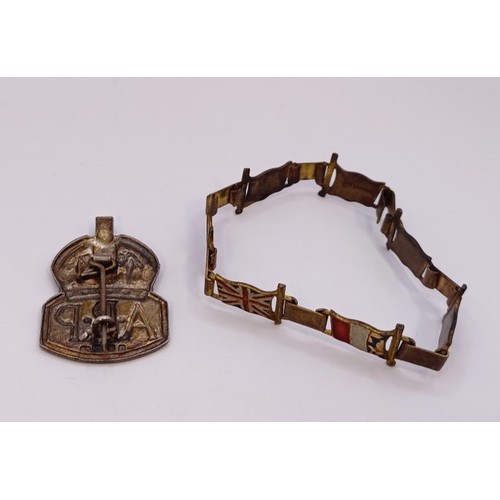 591 - A gilt metal and enamel novelty bracelet, decorated flags of World War II Allies, and a ARP badge (2... 