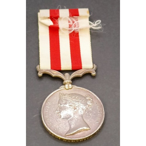 573 - An Indian Mutiny medal, awarded to Thos M Madgwick 82nd Regiment, with copy documentation