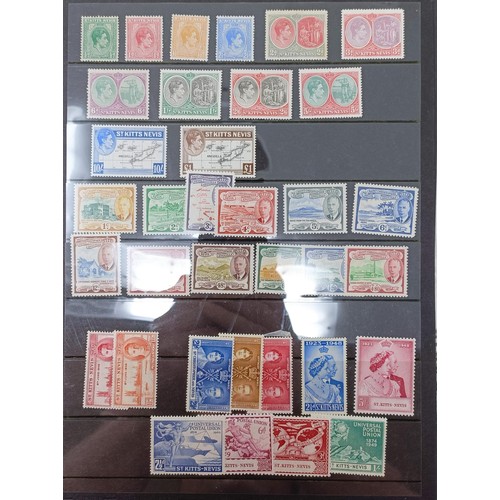 665 - A group of St Lucia and St Kits sets, some unmounted