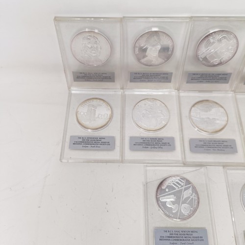 343 - A set of twelve silver proof 1 ozt commemorative medallions, in plastic capsules...