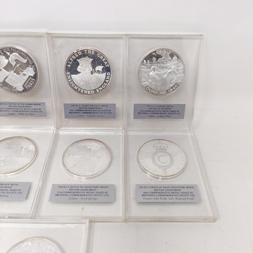 343 - A set of twelve silver proof 1 ozt commemorative medallions, in plastic capsules...