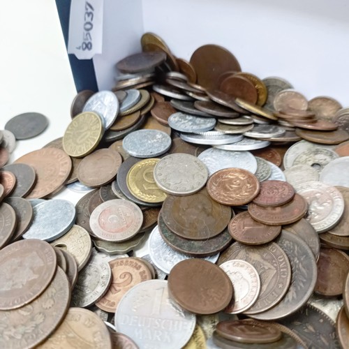 344 - A Victorian half crown, 1887, two crowns, and assorted world coins...