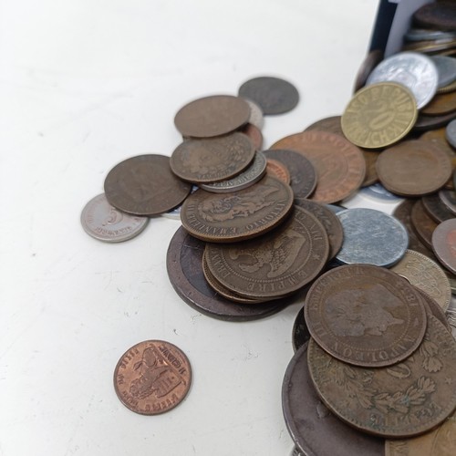 344 - A Victorian half crown, 1887, two crowns, and assorted world coins...