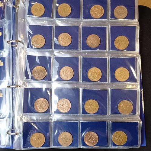 349 - A large group of GB coins, in six albums (6)...